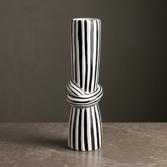 Tall black and white striped ceramic vase with a sculpted knot, 29 cm